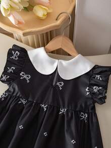 SHEIN Elladie kids 女童优雅黑色蝴蝶结印花喇叭袖荷叶领高腰A字公主裙，适合旅行、度假、派对、生日礼物、夏季 - 黑色 - 查看 6