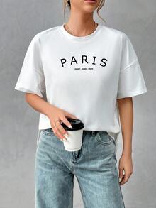 SHEIN Essnce 女士95%纯棉柔软简约基础款短前长后T恤，巴黎印花 - 时尚休闲上衣，适合外出、旅行、度假、海滩、派对、生日、音乐节、居家穿着、返校季、复古Y2K风、柔美少女/清新少女风、运动、Z世代夏季骑行和瑜伽等场合 - 白色 - 查看 6