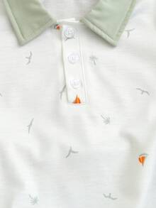 SHEIN 这款幼儿男童夏季休闲两件套，包含一件棕榈树和小船印花翻领Polo衫和一条松紧腰短裤，时尚舒适，适合6个月至3岁的男童，是日常穿着、户外活动和返校的理想之选。 - 綠色 - 查看 4