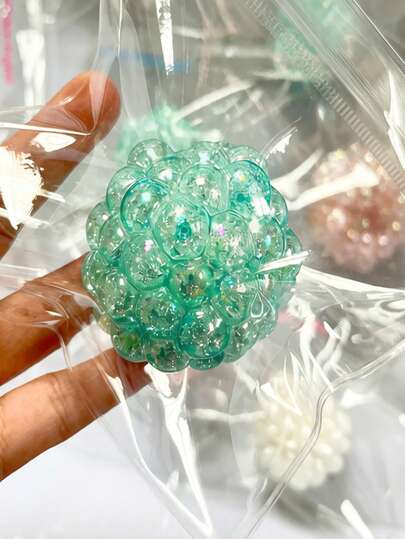 POKOJA LAND 一款会发出响声的珠子减压挤压玩具，包含蓝色、粉色和白色三种颜色，可作为指尖玩具、软绵绵的慢回弹玩具，适合儿童、女孩玩耍，是生日、派对、圣诞节和节日的可爱礼物。