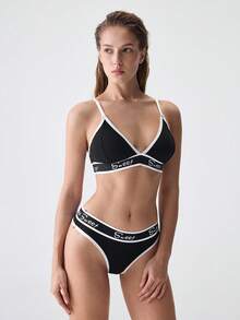 Loungeista Conjunto de lencería deportiva de soutien y panty con cinta contrastante y diseño de letras para yoga - Blanco y Negro - Ver 5