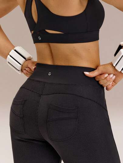 GLOWMODE Modal Ribbed Grooving & Glowing Seamless Waist Back Pockets Flare Leggings Medium Impact Studio Gym Workout Daily Casual Wear