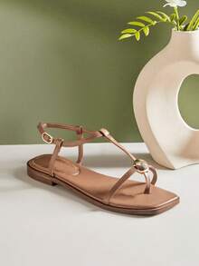 SHUZIA Women's Minimalist Comfortable Gold Metal Decor Ankle Strap Thong Flat Sandals - Mocha Brown - View 1
