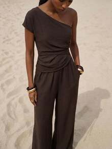 Zivah Bộ jumpsuit màu nâu cà phê, hàng mới về mùa Xuân/Hè 2026, thích hợp cho mùa cưới, lễ hội âm nhạc, lễ Phục Sinh, phong cách miền Tây, Boho, tiệc tùng lấy cảm hứng từ Nashville, đám cưới, buổi tối, hẹn hò, tụ họp, sinh nhật, sinh viên, đi làm, công sở thường ngày. Không tay, hở lưng gợi cảm, nhún eo, có túi thật, ống rộng thoải mái, chất liệu vải có họa tiết. - Cà phê nâu - Xem 7