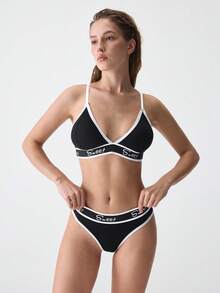 Loungeista Conjunto de lencería deportiva de soutien y panty con cinta contrastante y diseño de letras para yoga - Blanco y Negro - Ver 6