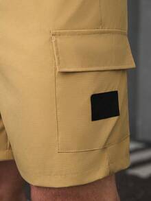 SLATEMANN 男士成熟街头风弹力腰带多口袋休闲工装短裤，适合日常休闲穿着、周末外出、旅行、与朋友聚会等场合。这款百搭短裤是男士衣橱必备单品，也是送给男友或丈夫的绝佳礼物。 - 卡其色 - 查看 5