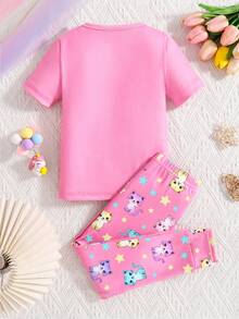 1 set Pijama de top de manga corta y pantalones ajustados con estampado de gato lindo que brilla en la oscuridad para niñas jóvenes - Rosa - Ver 2