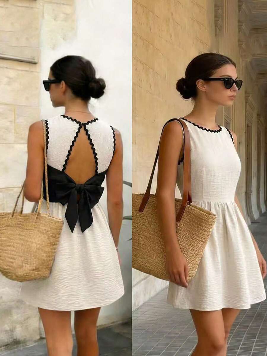 Pariaura Đầm nữ không tay màu mơ và đen, kiểu dáng gợn sóng, thắt eo bằng ruy băng, thích hợp cho đi làm, đi nghỉ mát, đi biển, mặc hàng ngày, mùa xuân/hè, đầm hè, đầm trắng, đầm hở lưng, đầm dự tiệc. - Nhiều màu - Xem 1