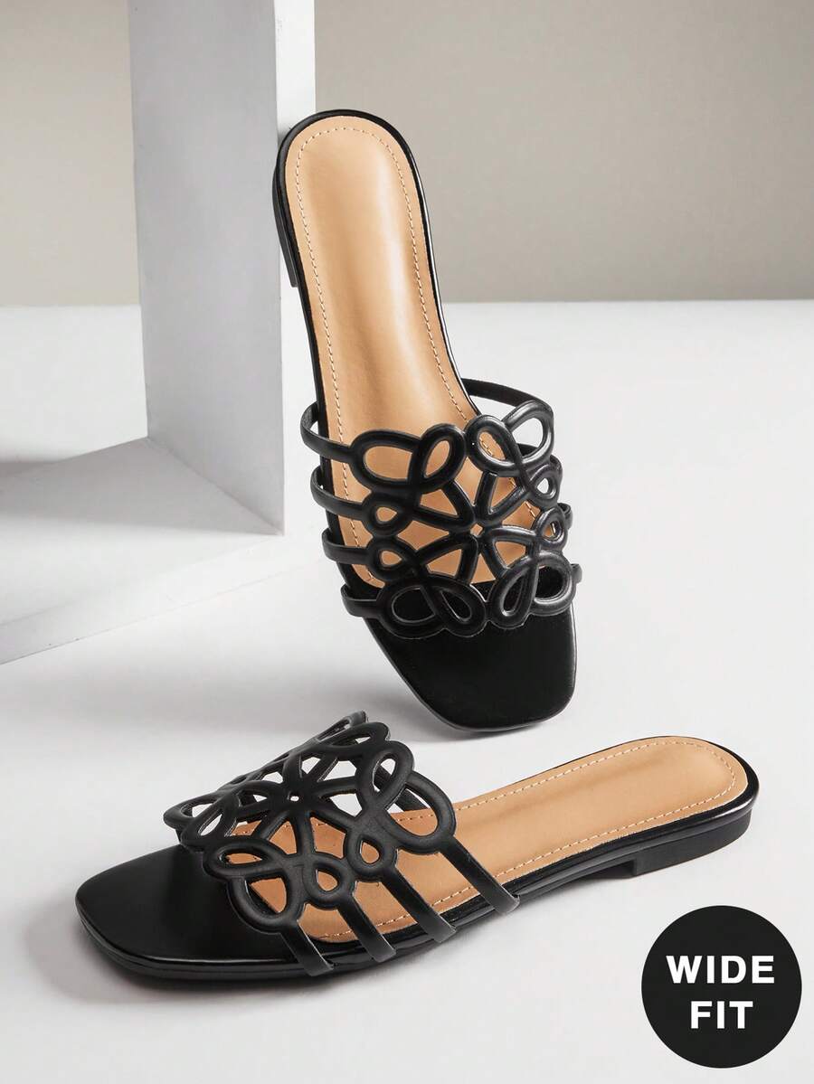 SHUZIA Women's Wide-Fit Fashionable Elegant Floral Cut-Out Slip-On Flat Sandals - Black - View 1