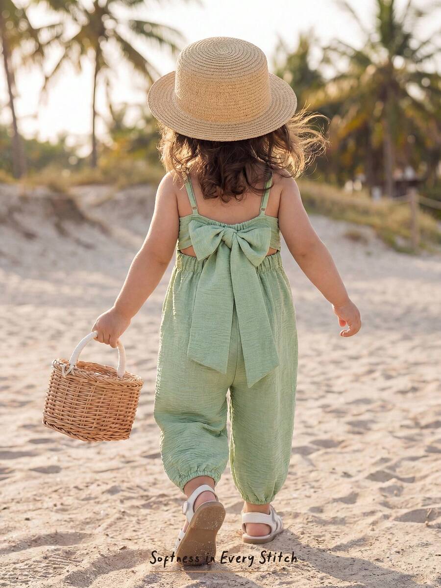 Cozy Pixies Bộ áo liền quần cho bé gái màu trơn, thoải mái, có nơ trang trí, màu xanh lá cây nhạt, chất liệu vải lanh, quần áo trẻ em. - màu xanh lá - Xem 1
