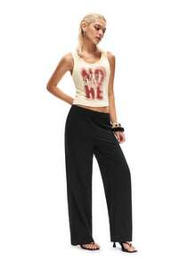 SHEIN Based On A Beige U-Neck Tank Top Paired With Pure Black Wide-Leg Pants, The Visual Highlight Is The Distressed Red-Brown Print On The Front Of The Tank Top, Which Creates A Retro American Vibe. The Wide-Leg Pants Feature An Elastic Waistband For A Relaxed, Flowing Silhouette. The Overall Look Is Loose And Carefree. - Multicolor - View 4