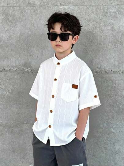 SHEIN 1 pieza Camisa casual de manga corta de color blanco sólido con cuello Mao para niños preadolescentes, de tela suave y texturizada, de moda, camisa de manga corta para niños preadolescentes