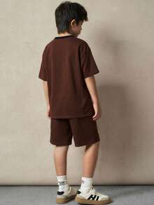 SHEIN Bộ 2 món áo thun ngắn tay cổ tròn phối màu cho bé trai tuổi teen, thích hợp mặc đi làm, đi học, mặc thường ngày, chơi thể thao, mùa xuân/hè. - Nhiều màu - Xem 3