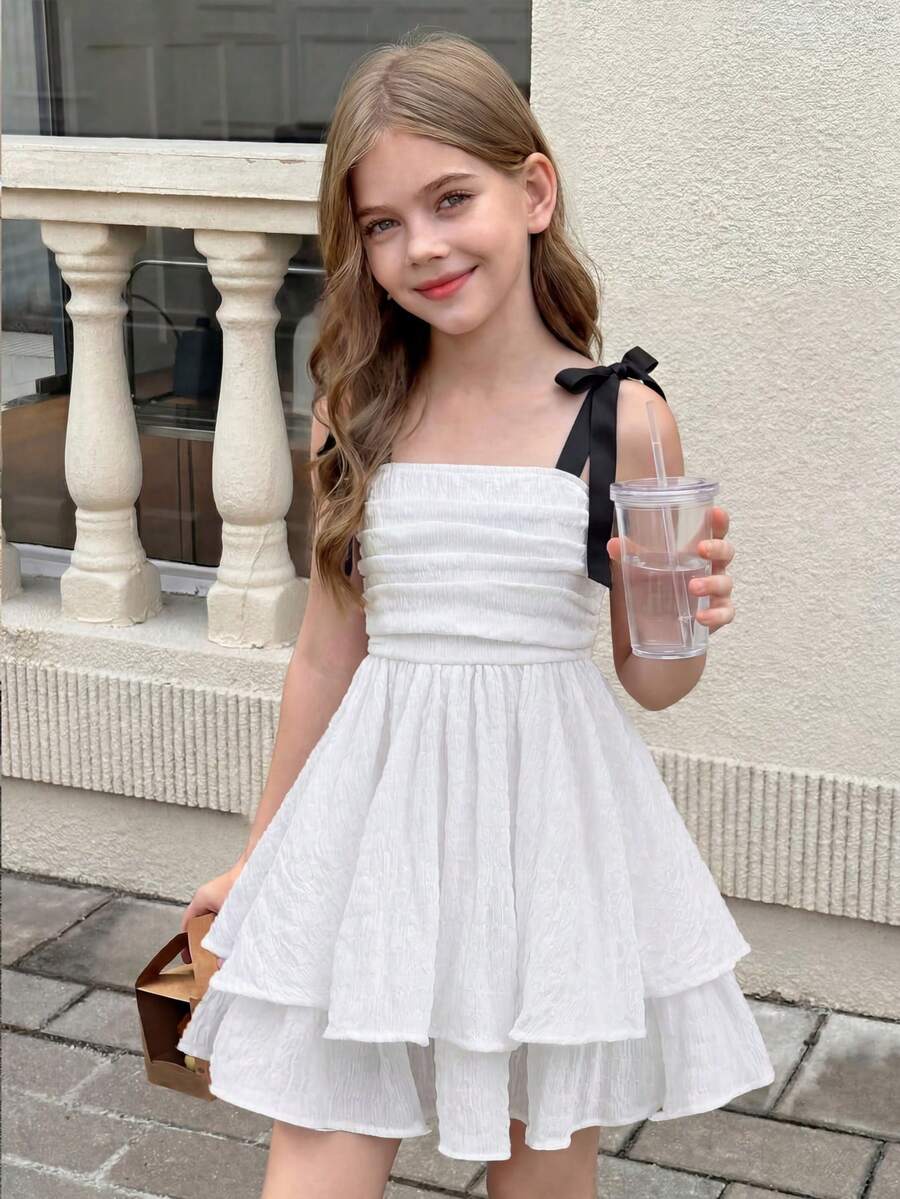 SHEIN 少女可爱纯色泡泡褶双层蛋糕休闲蝴蝶结吊带法式仙女裙，优雅蛋糕裙，毕业礼服，生日礼服，公主裙，花童礼服，白色连衣裙 - 白色 - 查看 1