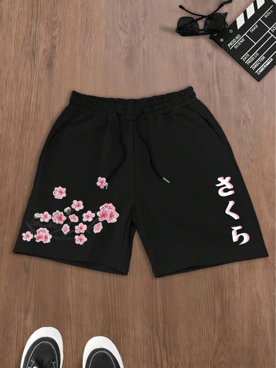 Manfinity RSRT 男士黑色短裤，饰以粉白樱花和日式樱花印花，日式风格，东方美学，休闲百搭，适合日常穿着、约会、夏季派对等场合。 - 黑色 - 查看 1