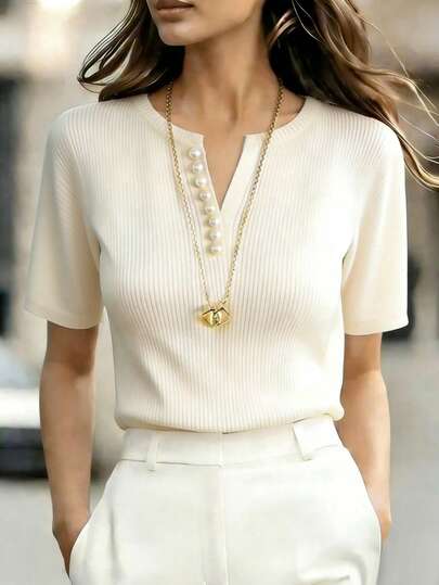 Franclia Women's Off-White T-Shirt With A Round Neck, V-Neck, Half-Open Placket, Pearl Embellishments, Short Sleeves, And Loose Fit, Made Of Cloud-Feel Quilted Fabric. Pair It With A Delicate Pearl-Embellished, Loose-Fitting Short-Sleeved Knit Top, Summer Knit Top, Women's Clothing, Off-White Top, Off-White Shirt, Apricot Women's Shirt, Party Top, Women's Beachwear, Women's Casual Top, Women's Vacation Wear, Summer Holiday Wear, Women's Commuting Wear, Summer Top, Women's Spring Wear, Women's Winter Top, Inner Layer Top, Off-White T-Shirt.Graduation Season Attire, Fashionable Casual Commuter Wear, Business Office Wear, Versatile And Stylish Everyday Casual Wear, Urban Teacher's Professional Attire