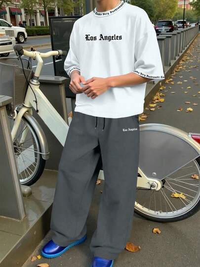 Manfinity EMRG Men's Letter Print Round Neck Short Sleeve T-Shirt And Shorts Casual Suit