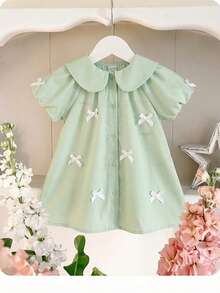 SHEIN Đầm ngắn tay màu xanh lá cây dễ thương cho bé gái, cổ Peter Pan, thắt nơ, thích hợp cho mùa hè. - Màu xanh Bạc hà - Xem 4