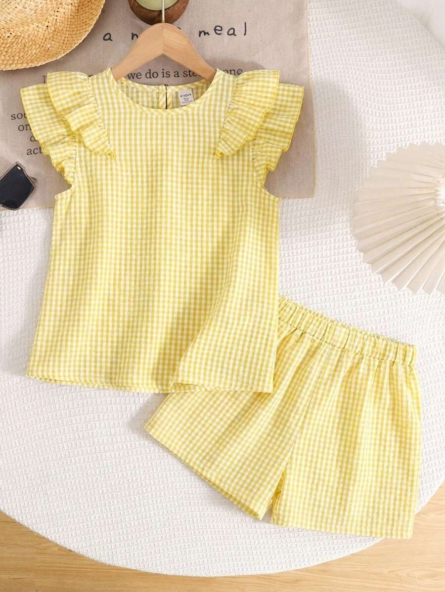 SHEIN LMoss Kids Set de 2 piezas de blusa con cuello redondo y volantes y pantalones casuales y cómodos de color amarillo para niñas preadolescentes - Amarillo - Ver 1