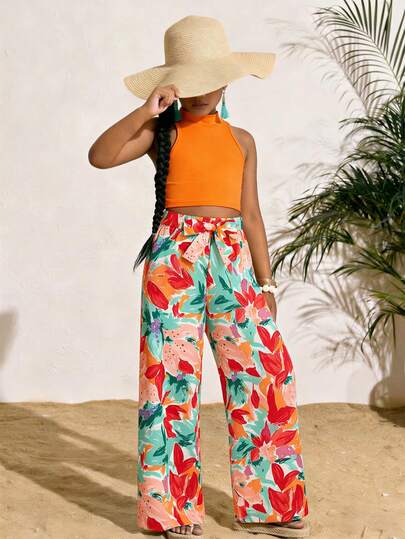 Sparklyn Bright Orange Sleeveless Top Paired With Colorful Floral Wide-Leg Pants For Tween Girls, Energetic Look With High Neck & Cold Shoulder Design, Snug Fit & Chic, Relaxed Wide-Leg Pants In Soft Fabric Allow Free Movement, Suitable For Vacation & Everyday Wear, Easy To Be The Spotlight.