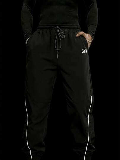 RISE LYT Quần thể thao nam kiểu boyfriend với họa tiết chữ, dây rút eo, viền sọc tương phản, thấm hút mồ hôi, nhẹ, thoải mái, thiết kế tối giản, ôm sát, thích hợp cho tập luyện ngoài trời, tập gym.