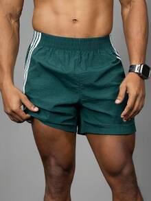 Acti Log Pantalones cortos deportivos casuales con rayas de contraste para hombres, pantalones cortos de gimnasio, pantalones cortos verde azulado, pantalones cortos deportivos con rayas, pantalones cortos deportivos duraderos con rayas verdes para hombres con bolsillos, ligeros - Verde - Ver 9
