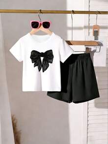 2 pezzi/set Maglietta a maniche corte con scollo tondo e stampa farfalla nera minimalista e pantaloncini larghi casual per ragazze giovani, motivo carino e alla moda adatto per primavera ed estate, completo casual per ragazze, set di maglietta e pantaloncini per bambine - Bianco - Visualizzare 3