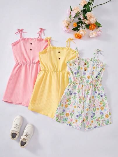 SHEIN Genkimix Kids 3pcs/Set Girls' Ruffle Strap Romper Set - From Fresh Floral To Solid Colors, Three Styles To Switch Freely. Spaghetti Strap Design Fits The Shoulder Line, Ruffled Collar Like A Small Cake Edge, Elastic Waist For A Neat Proportion. Shorts Style Allows Free Movement, Whether For Picnics, Photos Or Daily Wear, It Can Add A Sweet Filter To The Whole Summer!