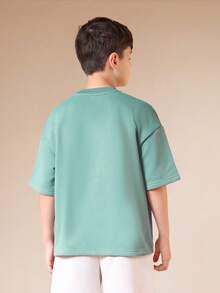 SUMWON Oversized Vintage Tween Newport Island Grafik T-Shirt und lässige Shorts 2-teiliges Sommer Set mit Rundhals Kurzarm Top und locker sitzender Hose - Grün - Übersicht 2