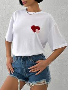 EURMUSE Camiseta feminina branca folgada com bordado de coração – Camiseta casual de manga curta em mistura de algodão, com estampa de coração vermelho, blusa oversized de verão, estilo streetwear minimalista, confortável. - Branco - Ver 1