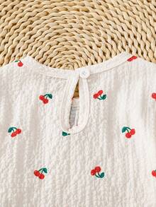 Đầm ngắn tay bồng xếp ly in hình quả anh đào dễ thương cho bé gái, thích hợp mặc đi ngủ. - Màu be - Xem 3