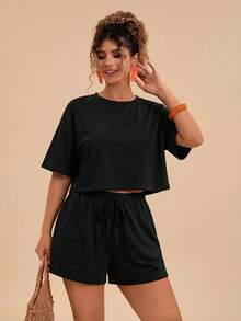 Travachic Bộ đồ 2 món cỡ lớn: Áo thun ngắn tay cổ tròn in họa tiết hoa nhiệt đới nhiều màu sắc và quần short. - màu đen - Xem 1