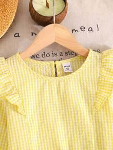 SHEIN LMoss Kids Set de 2 piezas de blusa con cuello redondo y volantes y pantalones casuales y cómodos de color amarillo para niñas preadolescentes - Amarillo - Ver 4