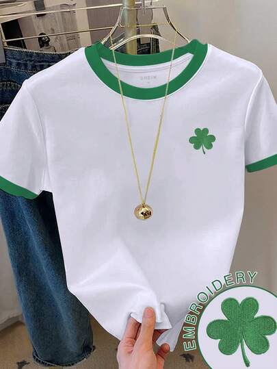 Resyla Camiseta casual de cuello redondo de manga corta con estampado de trébol de cuatro hojas y bloques de color para mujer