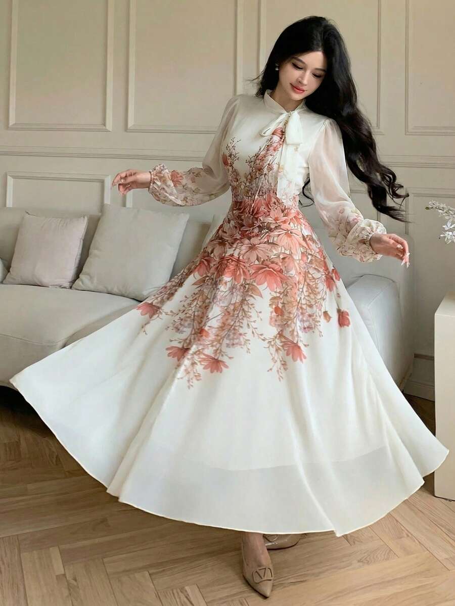 Modelyn فستان طويل الأكمام مطبوع بطباعة مرتبة مع ربطة الخصر للنساء - متعدد الألوان - مشاهدة 1