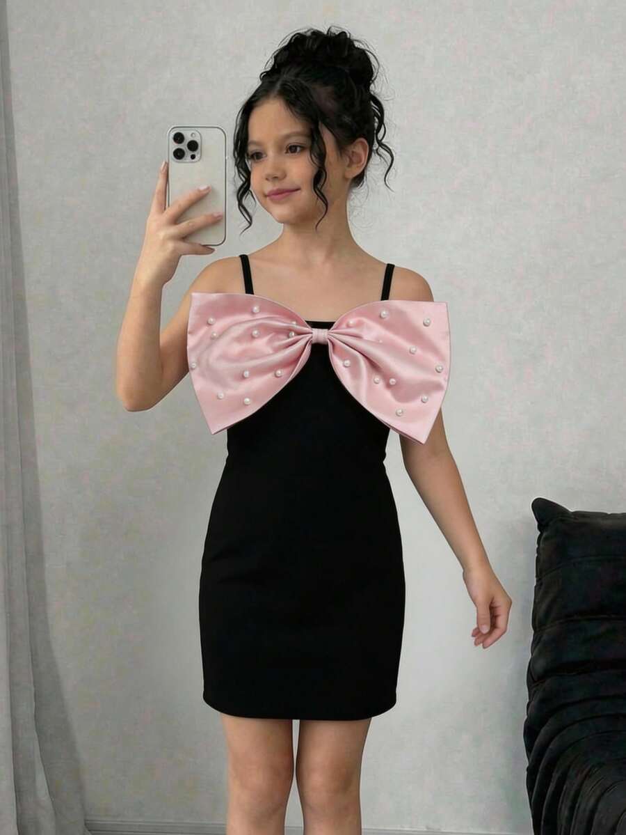 SHEIN Tween女孩修身顯瘦優雅拼色時尚蝴蝶結貼身洋裝,胸前大蝴蝶結裝飾,珠飾設計,春夏小洋裝,適合度假、派對、嘉年華、海灘、郵輪、下午茶,適用婚禮季、情人節派對、聚會、學校,公主風洋裝 - 黑色 - 查看 1
