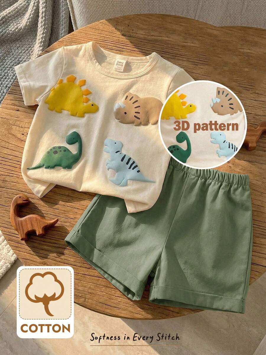 Cozy Pixies Zestaw 2 sztuk dla chłopca z nadrukiem dinozaura, dzianinowy top z okrągłym dekoltem i krótkim rękawem oraz spodnie z elastyczną talią - Wielokolorowe - Zobacz 1