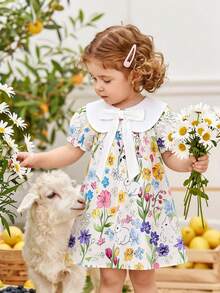 Souflis Souflis Baby Mädchen Peter Pan Kragen Fliege Puffärmel Blume Muster Baby Mädchen Kleid, Sommer Mode Urlaub Tropische Blumen Mädchen Süß Lässig Prinzessin Kleid Quetschig Sommer Outfits Kleider für Frühling Kleider für Mädchen Blumenkleid für Mädchen Quetschig Sommer Outfits Baby Kleidung für Mädchen Vintage Kleid für Baby Mädchen Ostern Kleider für Baby - Verschiedenfarbig - Übersicht 3