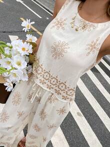 Serisse 女式几何印花吊带背心和裤子两件套，休闲度假装，女式夏季服装，女式两件套裤子，女式夏季服装，波西米亚风女装，春夏，女式夏季服装女式两件套，定位印花设计无袖上衣和阔腿裤套装，后背纽扣装饰设计，高腰松紧带长裤，定位印花竹麻纹理面料，度假和海滩通勤 - 彩色 - 查看 6