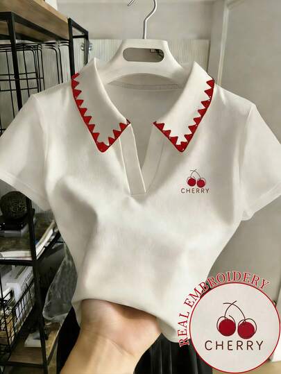 Resyla Blusa de mujer con cuello polo y manga corta de color contrastante