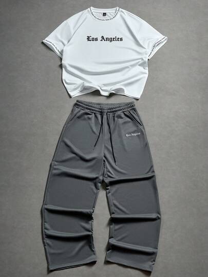 Manfinity EMRG Men's Letter Print Round Neck Short Sleeve T-Shirt And Shorts Casual Suit