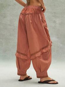 Bohemela Quần dài nữ phong cách Bohemian mùa hè giản dị và thoải mái, hoàn hảo cho thời trang đường phố, kỳ nghỉ và các lễ hội âm nhạc miền Tây. Quần dài dệt màu trơn phong cách Bohemian với chi tiết bèo nhún kiểu La Mã, các mảng vải thêu thủ công và kiểu dáng rộng rãi, thoải mái. - trái cam - Xem 7