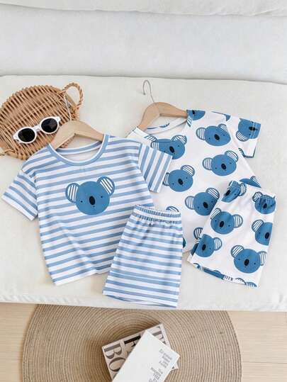 SHEIN Bộ đồ ngủ tay ngắn 4 món cho bé trai, gồm áo cổ tròn và quần, với họa tiết động vật và sọc. Chất vải mềm mại và thoải mái, phù hợp cho trẻ mặc hàng ngày.