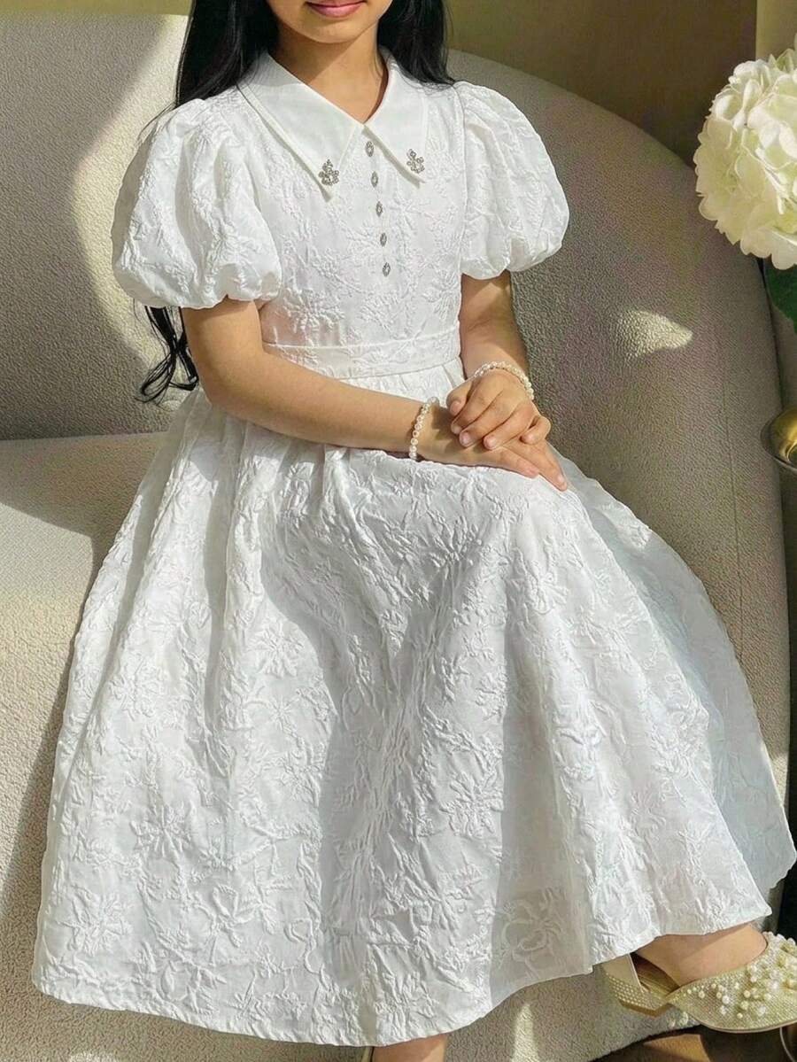 SHEIN Vestido casual y elegante para niñas preadolescentes de primavera/verano con estampado floral de jacquard, decoración de moño, cuello con strass, falda acampanada y mangas abullonadas, color blanco, adecuado para el Día de San Valentín, bodas y fiestas - Blanco - Ver 1