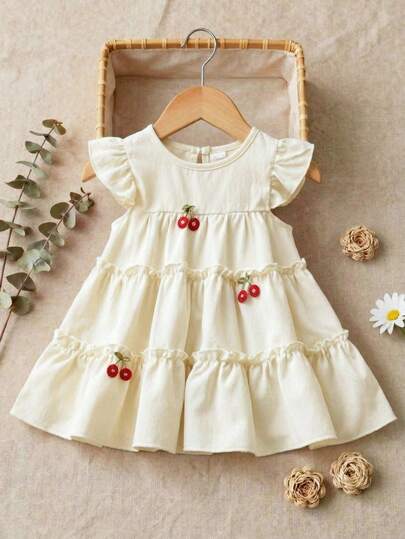 SHEIN Vintaside Kids 1 chiếc đầm cổ tròn màu trơn thoải mái, thời trang, thanh lịch cho bé gái, điểm nhấn là họa tiết quả anh đào dễ thương và viền bèo nhún, kiểu dáng cơ bản, tay áo xòe mềm mại, đa năng cho các dịp xuân/hè như đi học, du lịch, nghỉ mát.