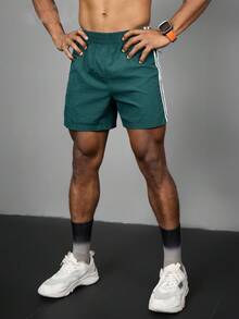 Acti Log Pantalones cortos deportivos casuales con rayas de contraste para hombres, pantalones cortos de gimnasio, pantalones cortos verde azulado, pantalones cortos deportivos con rayas, pantalones cortos deportivos duraderos con rayas verdes para hombres con bolsillos, ligeros - Verde - Ver 8