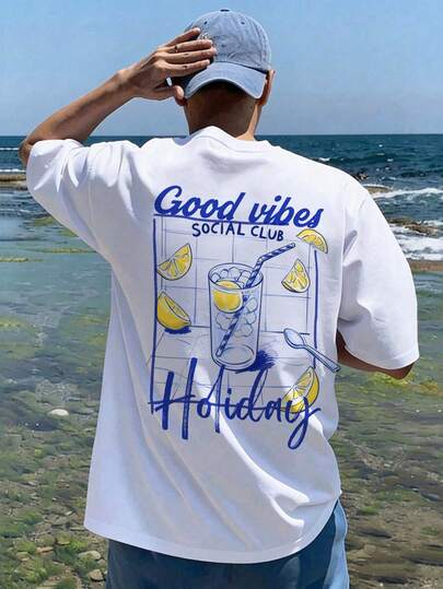 Manfinity Chillmode T-shirt à manches courtes pour hommes au style décontracté et vacances ! Imprimé citron frais + slogan décontracté, schéma de couleurs rafraîchissant bleu et blanc + imprimé graphique apaisant, dégage une ambiance de vacances lorsque porté