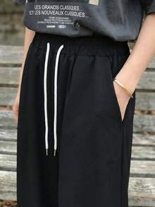 FRIFUL Women's Summer Airport Business Casual Solid Color Drawstring Waist Wide Leg Pants - Black - View 2