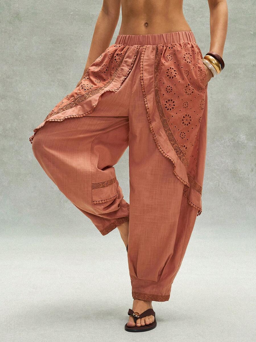 Bohemela Quần dài nữ phong cách Bohemian mùa hè giản dị và thoải mái, hoàn hảo cho thời trang đường phố, kỳ nghỉ và các lễ hội âm nhạc miền Tây. Quần dài dệt màu trơn phong cách Bohemian với chi tiết bèo nhún kiểu La Mã, các mảng vải thêu thủ công và kiểu dáng rộng rãi, thoải mái. - trái cam - Xem 1