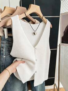 SHEIN Franclia Áo len cổ chữ V kiểu vintage, thích hợp mặc đi làm, phối đồ nhiều lớp. Thiết kế cổ chữ V nổi bật với khuy cài, họa tiết gân dọc, kiểu dáng tối giản nhưng vẫn thu hút ánh nhìn. Chất liệu vải dệt kim cao cấp, mềm mại và thân thiện với da, nhẹ nhàng và không gây khó chịu. Kiểu dáng rộng rãi, thoải mái, phù hợp cho đi làm, hẹn hò và mặc thường ngày. - trắng - Xem 6